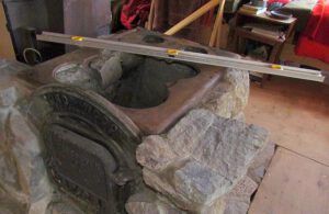 checking level of stone oven top (Building a Stone Oven Part Four.)