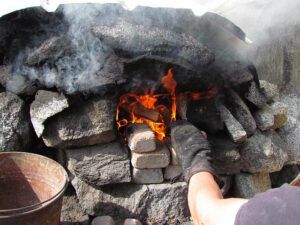 flaming oven (Baking Bread at Nuk Tessli)