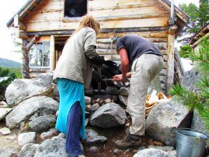 raking out ashes (Baking Bread at Nuk Tessli)