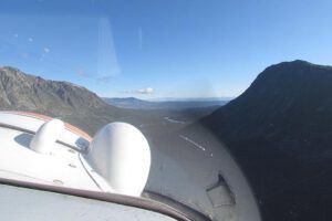 coming out of the mountains (Flying to Nimpo Lake)