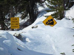 road signs buried (Trip to Bella Coola)