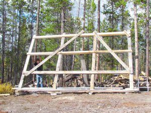 9c camille holding frame (September volunteer work at Ginty Creek)