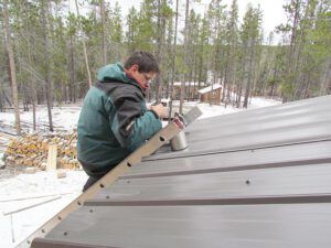 hugo on roof, snow (A taste of winter at Ginty Creek)