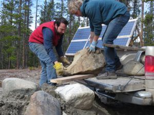 j moving rocks (Frantic work on the house.)