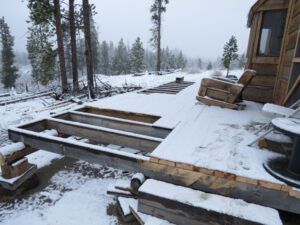 l deck in snow (Frantic work on the house.)