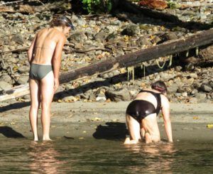 6. Examining bear tracks (Swimming with Grizzlies in the Atnarko River)