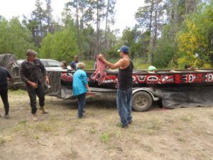 4a taking off covers (Canoe Blessing at Nehemiah)