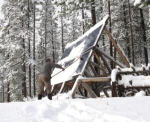 sweeping solar panels (Winter Comes to Ginty Creek)