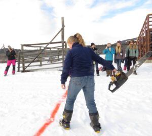 3 tossing saw 2 (Tatla Lake Winter Fun Party)