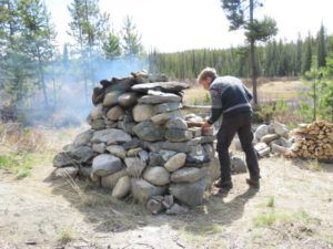 3 stoking stone oven (Bella Coola May 2017)