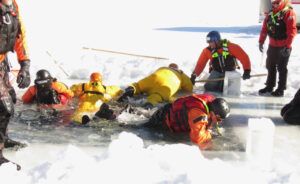 14 scrambling out. (SAR Ice Rescue Course)