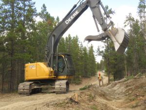 22 Excavator, puddle. (Road metamorphosis)